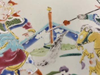 A Chinese famille rose dish with warriors on horseback, Qianlong